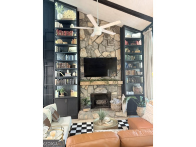 Nestled on a desirable corner lot near the North Gate, this on The Highlands Course at Lake Arrowhead in Georgia - for sale on GolfHomes.com, golf home, golf lot