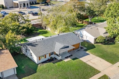 Set in the Valwood Park subdivision of Farmers Branch, this on Brookhaven Country Club - Golf Course in Texas - for sale on GolfHomes.com, golf home, golf lot
