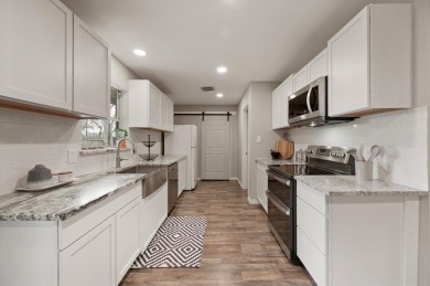 Set in the Valwood Park subdivision of Farmers Branch, this on Brookhaven Country Club - Golf Course in Texas - for sale on GolfHomes.com, golf home, golf lot