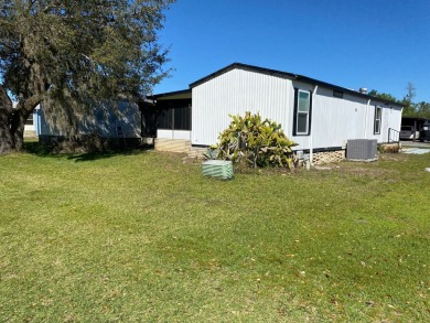 $36,000 Is a great deal, we are looking for a quick sale, in on Lake Henry Golf Club in Florida - for sale on GolfHomes.com, golf home, golf lot