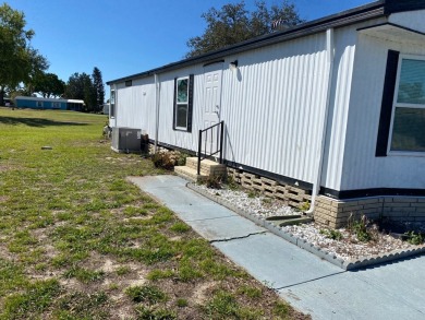 $36,000 Is a great deal, we are looking for a quick sale, in on Lake Henry Golf Club in Florida - for sale on GolfHomes.com, golf home, golf lot