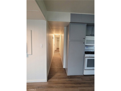 Welcome to this adorable single wide newly remodeled mobile home on Rancho Del Rey Golf Club in California - for sale on GolfHomes.com, golf home, golf lot