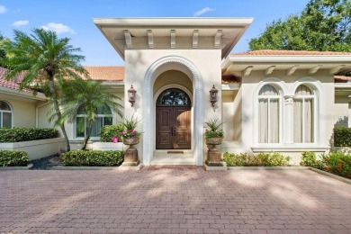 Tucked within the gates of Isleworth Golf Community and Country on Isleworth Golf and Country Club in Florida - for sale on GolfHomes.com, golf home, golf lot