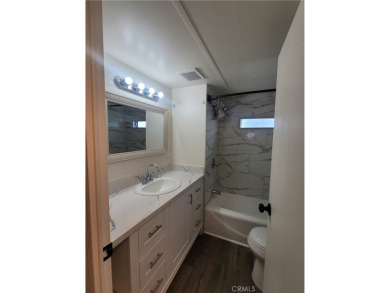 Welcome to this adorable single wide newly remodeled mobile home on Rancho Del Rey Golf Club in California - for sale on GolfHomes.com, golf home, golf lot