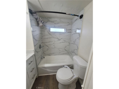 Welcome to this adorable single wide newly remodeled mobile home on Rancho Del Rey Golf Club in California - for sale on GolfHomes.com, golf home, golf lot