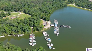 Don't miss your chance to snatch up this beautiful LAKE FRONT on Doe Valley Country Club in Kentucky - for sale on GolfHomes.com, golf home, golf lot