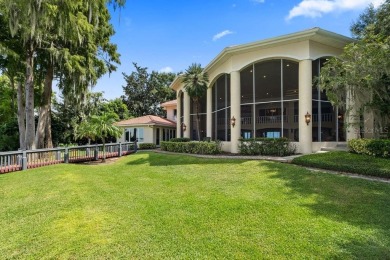 Tucked within the gates of Isleworth Golf Community and Country on Isleworth Golf and Country Club in Florida - for sale on GolfHomes.com, golf home, golf lot