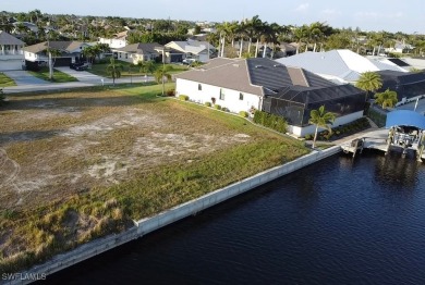 Seize this rare opportunity to own a prime Gulf access lot with on Royal Tee Country Club in Florida - for sale on GolfHomes.com, golf home, golf lot