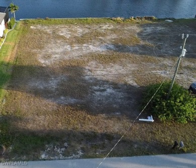 Seize this rare opportunity to own a prime Gulf access lot with on Royal Tee Country Club in Florida - for sale on GolfHomes.com, golf home, golf lot