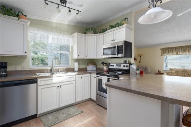 This beautifully maintained, fully furnished, turnkey 2-bedroom on Imperial Lakewoods Golf Club in Florida - for sale on GolfHomes.com, golf home, golf lot