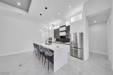 Welcome to this stunning new construction home located in one of on Burnt Store Golf Club in Florida - for sale on GolfHomes.com, golf home, golf lot