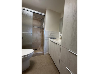 Gorgeous condo completely remodeled, sold totally furnish on Sunrise Lakes Phase III in Florida - for sale on GolfHomes.com, golf home, golf lot