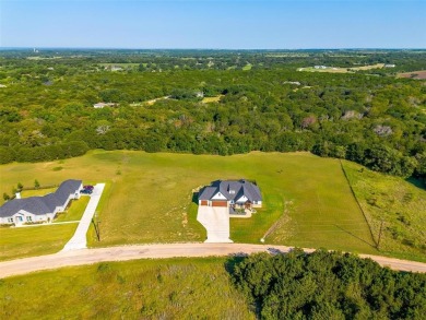 Gorgeous 2023 custom built modern farm house in the gated on White Bluff Resort - Old Course in Texas - for sale on GolfHomes.com, golf home, golf lot