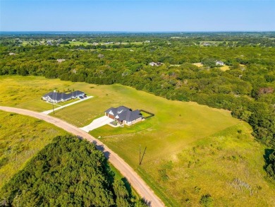 Gorgeous 2023 custom built modern farm house in the gated on White Bluff Resort - Old Course in Texas - for sale on GolfHomes.com, golf home, golf lot