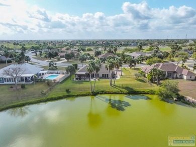 Lakefront Home! Built by well-known Five-Star *Buddy* Builder on South Padre Island Golf Club in Texas - for sale on GolfHomes.com, golf home, golf lot