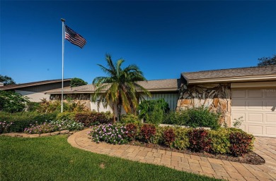 Welcome to this hidden gem right in the heart of Countryside! on Countryside Country Club in Florida - for sale on GolfHomes.com, golf home, golf lot