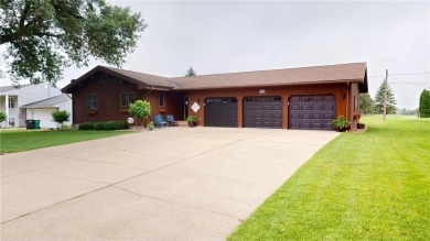 Nestled along the rolling greens of the golf course, this on Green Lea Golf Course in Minnesota - for sale on GolfHomes.com, golf home, golf lot