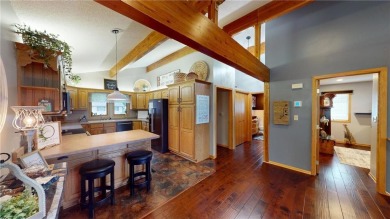 Nestled along the rolling greens of the golf course, this on Green Lea Golf Course in Minnesota - for sale on GolfHomes.com, golf home, golf lot