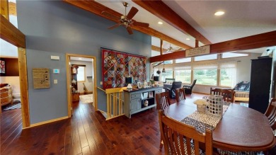 Nestled along the rolling greens of the golf course, this on Green Lea Golf Course in Minnesota - for sale on GolfHomes.com, golf home, golf lot
