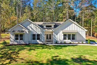 Discover this stunning new construction masterpiece in on Fairfield Plantation Golf and Country Club in Georgia - for sale on GolfHomes.com, golf home, golf lot