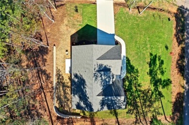 Discover this stunning new construction masterpiece in on Fairfield Plantation Golf and Country Club in Georgia - for sale on GolfHomes.com, golf home, golf lot