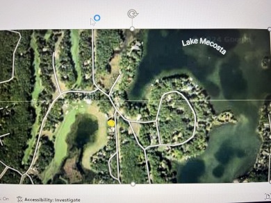 Lot surrounded by homes valued at $750,000 dollars or more on St. Ives Golf Club in Michigan - for sale on GolfHomes.com, golf home, golf lot