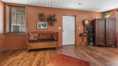 Welcome to your dream home--a beautifully updated, one-of-a-kind on Triple Lakes Golf Course in Illinois - for sale on GolfHomes.com, golf home, golf lot