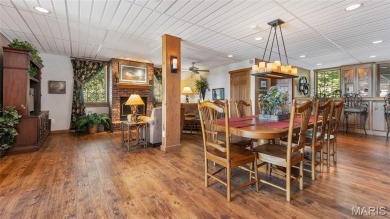 Welcome to your dream home--a beautifully updated, one-of-a-kind on Triple Lakes Golf Course in Illinois - for sale on GolfHomes.com, golf home, golf lot
