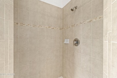 In the heart of LPGA International, this masterpiece blends on LPGA International Golf Course in Florida - for sale on GolfHomes.com, golf home, golf lot