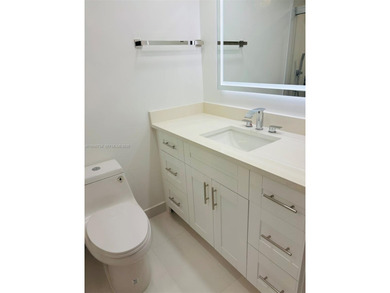 A must see!! Completely Remodeled, Modern and Full of Natural on Hillsboro Pines Golf in Florida - for sale on GolfHomes.com, golf home, golf lot