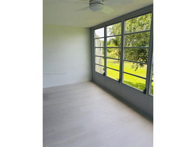 A must see!! Completely Remodeled, Modern and Full of Natural on Hillsboro Pines Golf in Florida - for sale on GolfHomes.com, golf home, golf lot