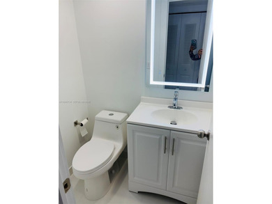 A must see!! Completely Remodeled, Modern and Full of Natural on Hillsboro Pines Golf in Florida - for sale on GolfHomes.com, golf home, golf lot