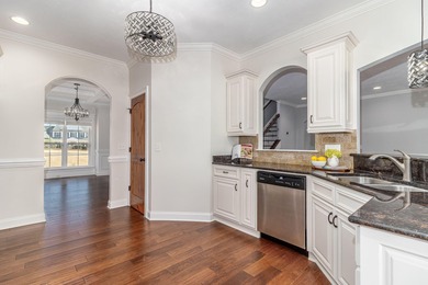 This large home in beautiful Bartram Trail is now updated and on Bartram Trail Golf Club in Georgia - for sale on GolfHomes.com, golf home, golf lot