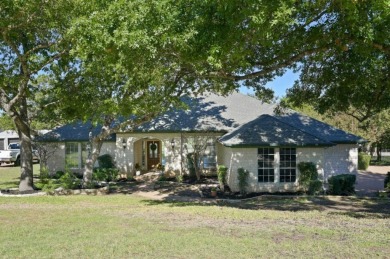 Welcome to 215 Clubhouse Dr., a stunning single-story home in on Yaupon Golf Course Lakeway in Texas - for sale on GolfHomes.com, golf home, golf lot