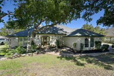 Welcome to 215 Clubhouse Dr., a stunning single-story home in on Yaupon Golf Course Lakeway in Texas - for sale on GolfHomes.com, golf home, golf lot