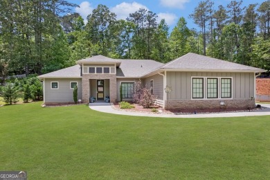 This designer home built for living, working, & playing. There on Fairfield Plantation Golf and Country Club in Georgia - for sale on GolfHomes.com, golf home, golf lot