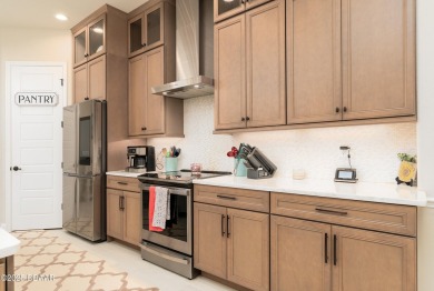 Nestled within the prestigious community of Portofino Reserve in on Venetian Bay Golf Course in Florida - for sale on GolfHomes.com, golf home, golf lot