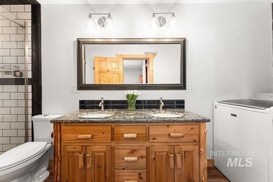 Custom-built timber cabin on over an acre with a 3-car garage on Terrace Lakes Golf Resort in Idaho - for sale on GolfHomes.com, golf home, golf lot