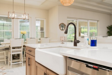 Nestled within the prestigious community of Portofino Reserve in on Venetian Bay Golf Course in Florida - for sale on GolfHomes.com, golf home, golf lot