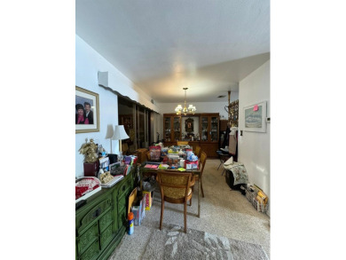 Investor Alert: 2 bedroom, 2 bathroom home featuring an open on Palm Aire Country Club of Sarasota in Florida - for sale on GolfHomes.com, golf home, golf lot