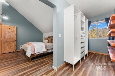 Custom-built timber cabin on over an acre with a 3-car garage on Terrace Lakes Golf Resort in Idaho - for sale on GolfHomes.com, golf home, golf lot