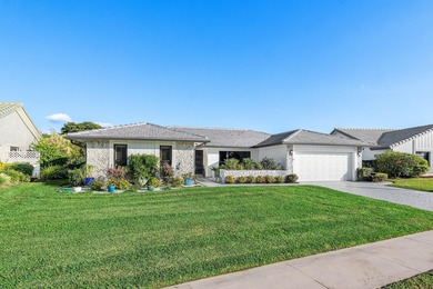 Stunning renovated ranch home with a modern open floor plan and on Boca Greens Country Club in Florida - for sale on GolfHomes.com, golf home, golf lot