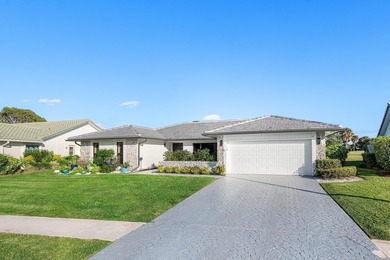 Stunning renovated ranch home with a modern open floor plan and on Boca Greens Country Club in Florida - for sale on GolfHomes.com, golf home, golf lot