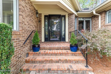 Discover this stunning brick home perfectly situated on the 6th on Pinehurst Resort and Country Club in North Carolina - for sale on GolfHomes.com, golf home, golf lot