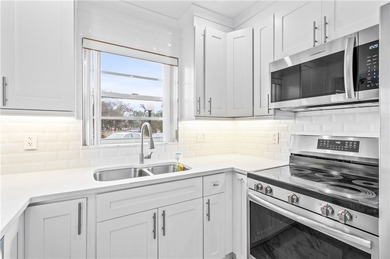 Rarely available, completely renovated modern condo in Vista on The American Golf Club in Florida - for sale on GolfHomes.com, golf home, golf lot