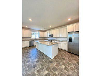 Located in a gated community within the Lake Las Vegas Golf on Falls Golf Course in Nevada - for sale on GolfHomes.com, golf home, golf lot