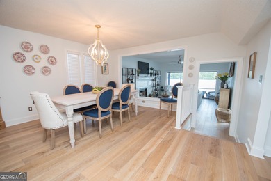 LAKEFRONT LIVING IN THE HEART OF PEACHTREE CITY!  Welcome to on Canongate At Flat Creek Club in Georgia - for sale on GolfHomes.com, golf home, golf lot