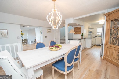 LAKEFRONT LIVING IN THE HEART OF PEACHTREE CITY!  Welcome to on Canongate At Flat Creek Club in Georgia - for sale on GolfHomes.com, golf home, golf lot