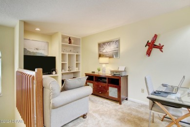 With a private, tranquil water and golf course view, this bright on Spruce Creek Golf Club in Florida - for sale on GolfHomes.com, golf home, golf lot