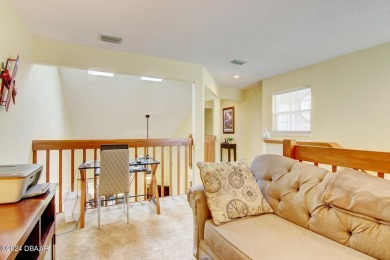 With a private, tranquil water and golf course view, this bright on Spruce Creek Golf Club in Florida - for sale on GolfHomes.com, golf home, golf lot